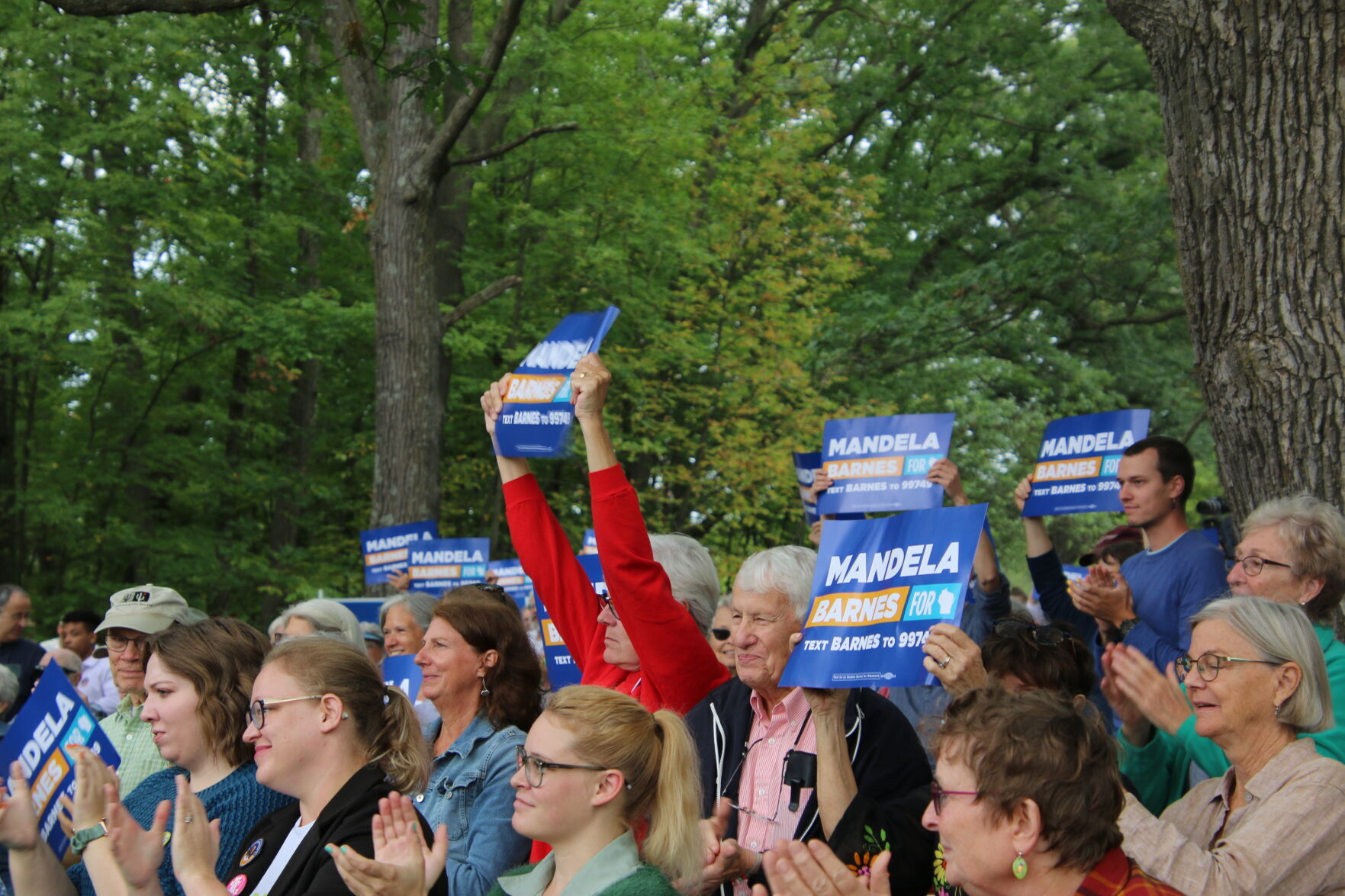 Crowd holding Barnes signs.JPG